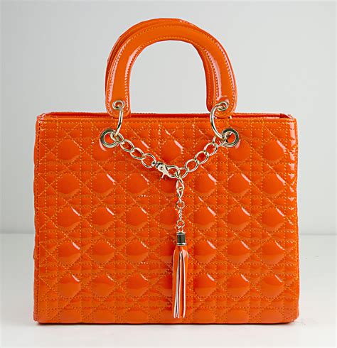 WOMEN'S LUXURY ORANGE BAGS AND HANDBAGS 